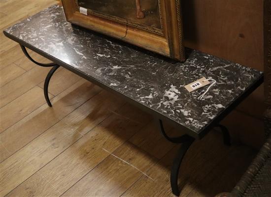 A rectangular wrought iron marble top coffee table L.121cm